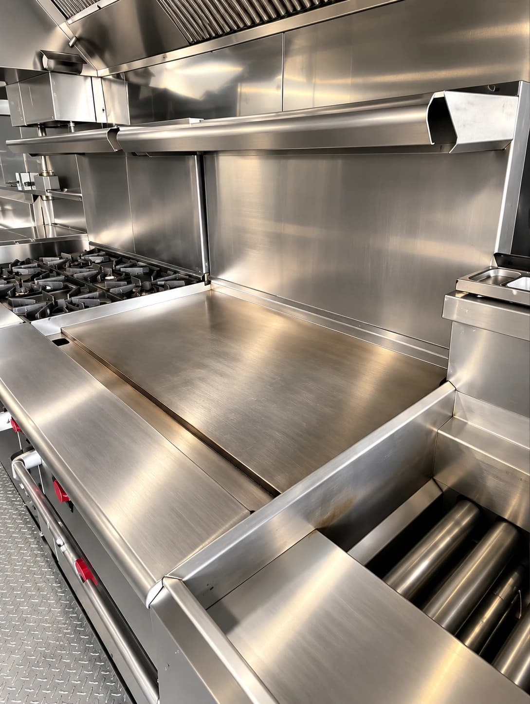 Stainless steel cooking line with range, griddle and preparation area