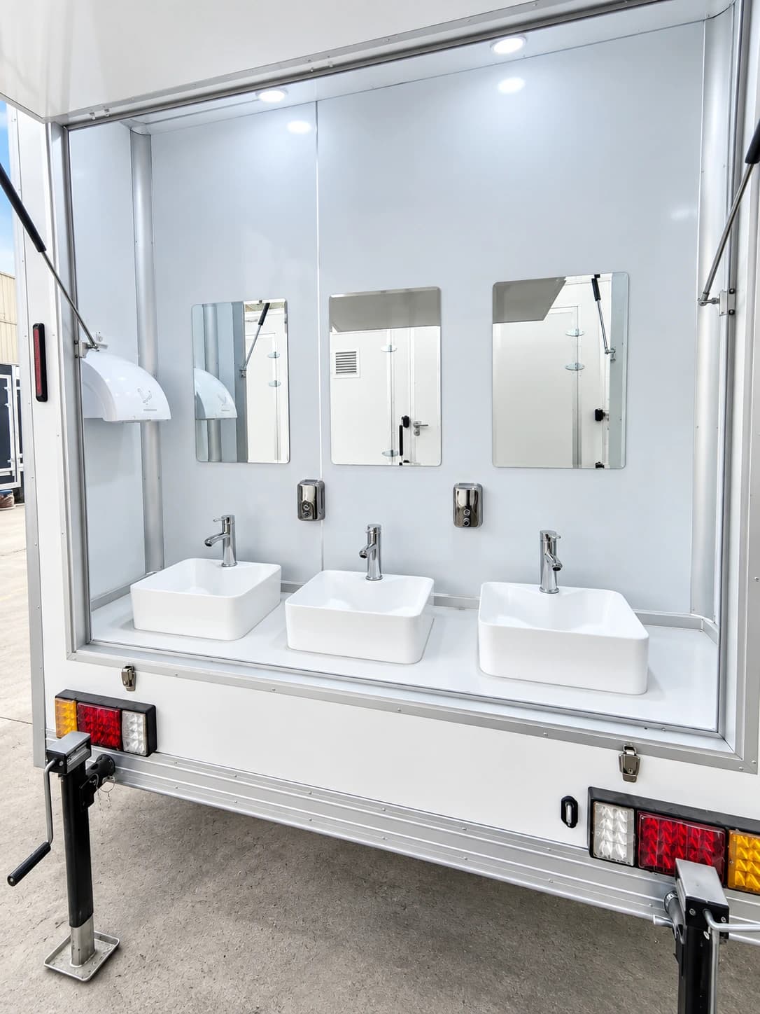 Standalone shower trailer sink and mirror area