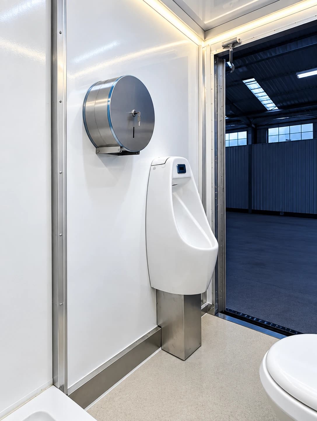 Temporary restroom trailer urinal and sink